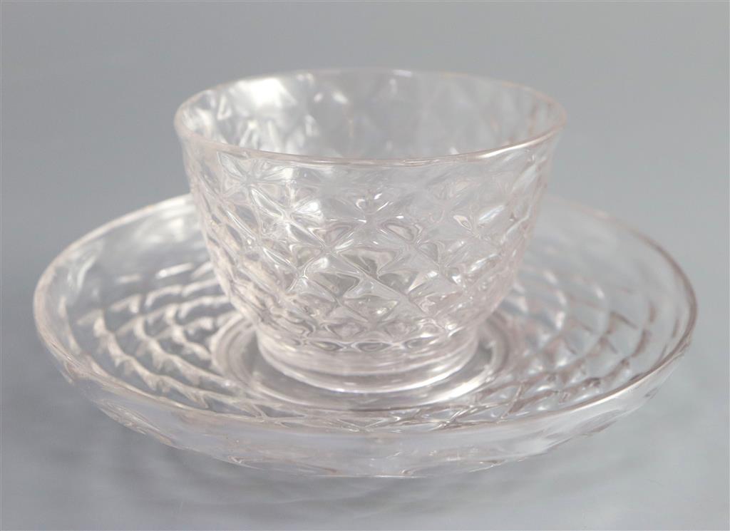 An unusual George II glass tea bowl and saucer, second quarter 18th century saucer 11.4cm diameter